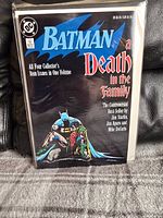 Front cover of the Batman graphic novel bagged and boarded showing title and cover art