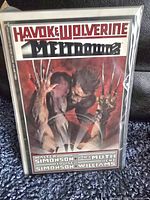 Front cover of Havok & Wolverine: Meltdown issue 3 comic book, bagged and boarded.