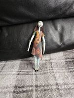 Front view of the MECA Sally figure showing detailed patchwork dress and facial features.