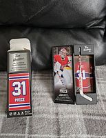 Front view of the boxed collectible miniature goalie stick featuring Carey Price, with prominent number 31, player image, and branding.
