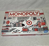 Sealed Monopoly Target Edition board game box showing the game branding and artwork featuring the Target mascot Bullseye.