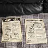 Original 1977 Kenner Star Wars Action Fleet instruction sheets for X-Wing Fighter and Darth Vader TIE Fighter.