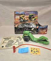 Green Road Ripper vehicle with mechanical roller, working seatbelt, ripper cord, instruction sheet, yellow sticker sheet, and original box in poor condition.