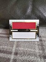 Front of the dual jersey card showing two jersey swatches for players Charlie Coyle and Matt Dumba