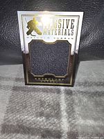 Front of the Panini Anthology Malcolm Subban jersey card showing the black fabric swatch with Massive Materials text.