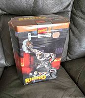 Photo of sealed box front showing Rhino Marvel Comics model kit by Toy Biz.