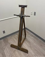 Front view of Anco Bilt wooden art easel showing height adjustment track and base support.