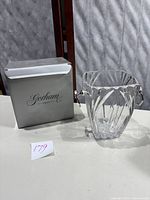 Gorham 1831 Esprit Crystal Ice Bucket next to original box on white surface.