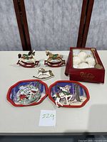 Lot of vintage Christmas ornaments including rocking horses, reindeer, decorative trays, and boxed glass ball ornaments.