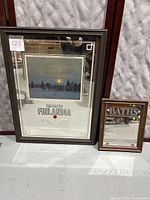 Both mirrors displayed side by side on floor against a padded background.