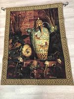 Full front view of the tapestry hanging on the rod showing complete design and border pattern.