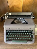 Front view of vintage Royal typewriter showing keyboard and branding