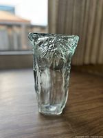 Front view of the vintage Spanish freeform glass vase showing textured, leaf-like patterns and irregular rim.