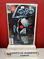 Photo of Lobo #1 comic book cover featuring a close-up image of the character Lobo with red eyes.
