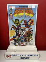 Front cover of Marvel Super Heroes Secret Wars #4 2015 SDCC Variant Comic showing multiple Marvel characters in mini-figure style on a blue background, in protective sleeve with price and condition label.
