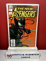 The New Avengers #35 comic book displayed upright against a red background, sealed in a plastic protective sleeve with backing board.