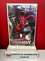 Front cover of Non-Stop Spider-Man #1 Derrick Chew variant comic book graded NM+ in protective sleeve, showing artwork of Spider-Man and Venom.