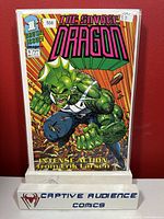 Front cover image of Savage Dragon #1 comic book showing the green dragon-like superhero breaking through a brick wall with bold colorful lettering.