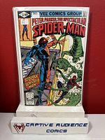Front cover of Spectacular Spider-Man #39 comic book showing Spider-Man and Scourge Schizoid Man in an action scene.