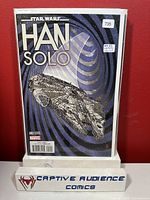 Photo of Star Wars Han Solo #2 Marvel 1:10 Variant comic book with Millennium Falcon on cover, near mint condition, bagged and backed.