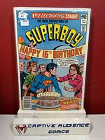 Front cover photo of The New Adventures of Superboy #1 comic book showing Superboy with a birthday cake, condition VF-.