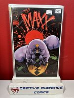 Front cover of The Maxx #1 comic book in protective sleeve, showing character and publisher logo.