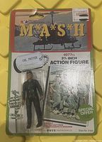Front view of 1982 MASH Col Potter action figure packaging showing blister card and figure.
