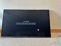 Front view of TV screen displaying 'No Signal' message