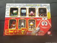 Front view of sealed Bandai Mini Robo 7 Burn Figure Set in original box showing all seven figures.