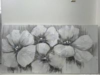 Full view of large rectangular wall art painting with six textured white flowers on a grey and black background.