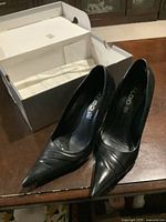 Pair of black Aldo women's leather heeled shoes size 8, showing pointed toe design and Aldo branding inside.