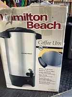 Photo of the Hamilton Beach coffee urn box, showing the product image and branding.