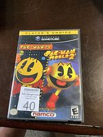 Front cover of Nintendo GameCube game case for Pac-Man vs. and Pac-Man World 2 showing game art and labels.