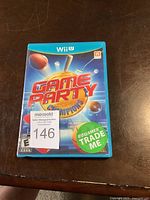Front cover of Wii U game case for Game Party Champions showing colorful sports-themed artwork.