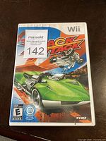 Front cover of the Wii game case for Hot Wheels Track Attack showing artwork and branding.