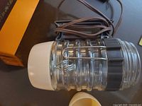 Coffee maker jar with collar, cord, heating element visible