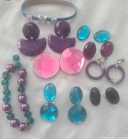 Group shot of all jewelry items arranged on surface