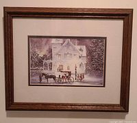 Full view of framed winter scene print on wall