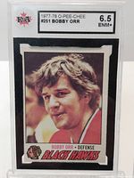 Front of graded 1977-78 O-Pee-Chee Bobby Orr hockey card showing player image, card details and 6.5 grade