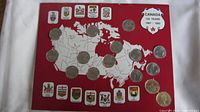 Canada 125 Years Provincial/Confederation quarter set displayed on red background with map and provincial coat of arms.