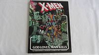 Front cover of X-Men Graphic Novel No. 5 showing color illustration of X-Men characters and title 'God Loves, Man Kills'.