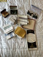Overview of all handkerchiefs, cufflink boxes and shoe jewelry bag
