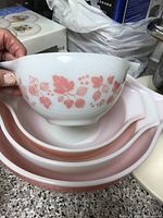 Small Cinderella bowl with Pink Gooseberry print nested in larger bowls