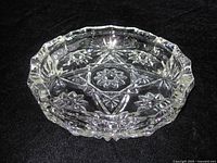 Angled view of crystal bowl showing cut pattern and form