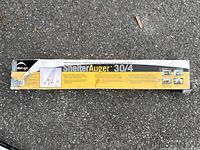 Box of ShelterLogic Shelter Auger 30/4 Anchor Kit showing product branding and condition