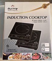 Box for Duxtop Induction Cooktop Model 8100MC and 8120MC, showing branding and model information.