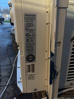 Side label of Kenmore window air conditioner showing technical specs and model number 580.91519900.