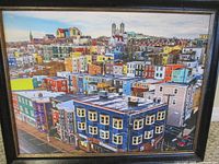 Framed art print showing a vibrant view of Jellybean Row in St. John's, Newfoundland.