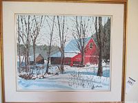 Frontal image of the framed oil painting showing a red barn in a winter scene with snow and leafless trees, signed J. Murphy.
