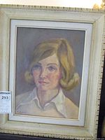 Framed oil on board portrait of woman with blonde hair, mid-century modern style, signed M. Rickaby 1976. Shows full painting in frame.